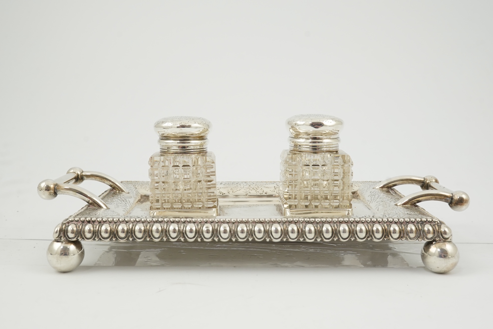 A late Victorian silver two handled rectangular inkstand by George Unite